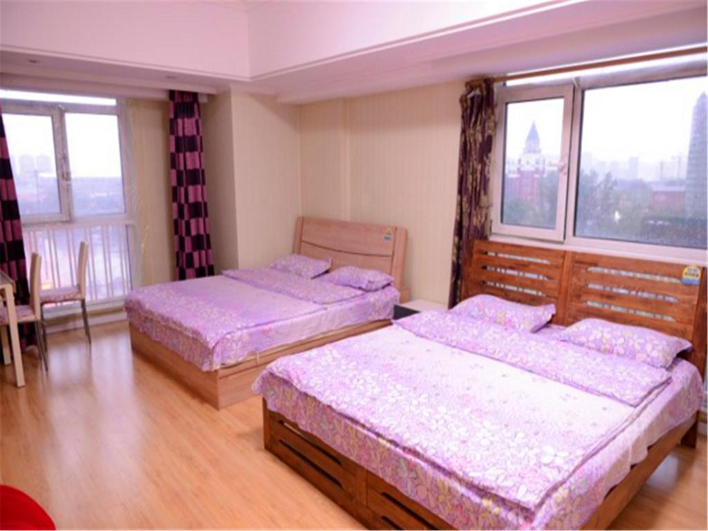 Green Express Apartment Harbin West Railway Station Chambre photo